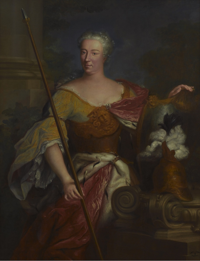 Obraz olejny. Przedstawia portret Elżbiety Sieniawskiej jako Minerwy. Kobieta ubrana w suknię z gorsetem z maską. Po prawej stronie obrazu hełm z piórem i napierśnik. Kobieta trzyma w prawej ręce oszczep. Po lewej stronie kolumna, w tle pejzaż.